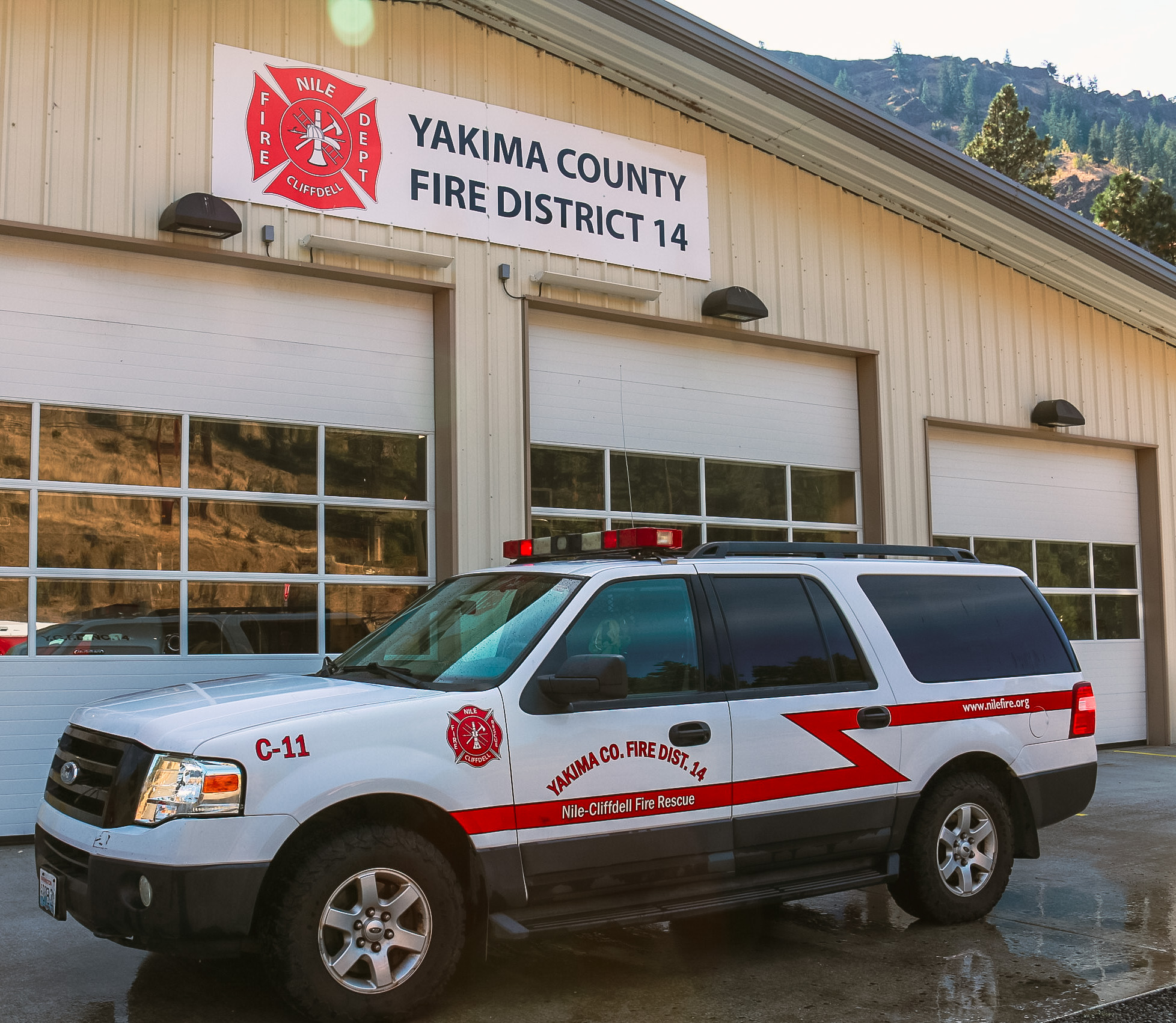 Command 11 C.H.A.O.S. Ford Expedition posed outside Yakima County Fire District 14