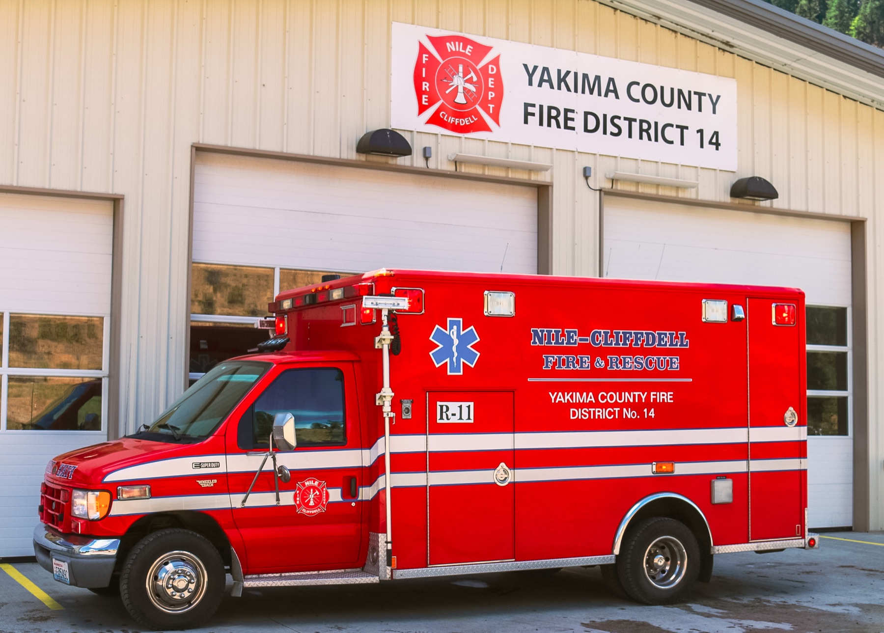 Rescue 11 posed outside Yakima County Fire District 14