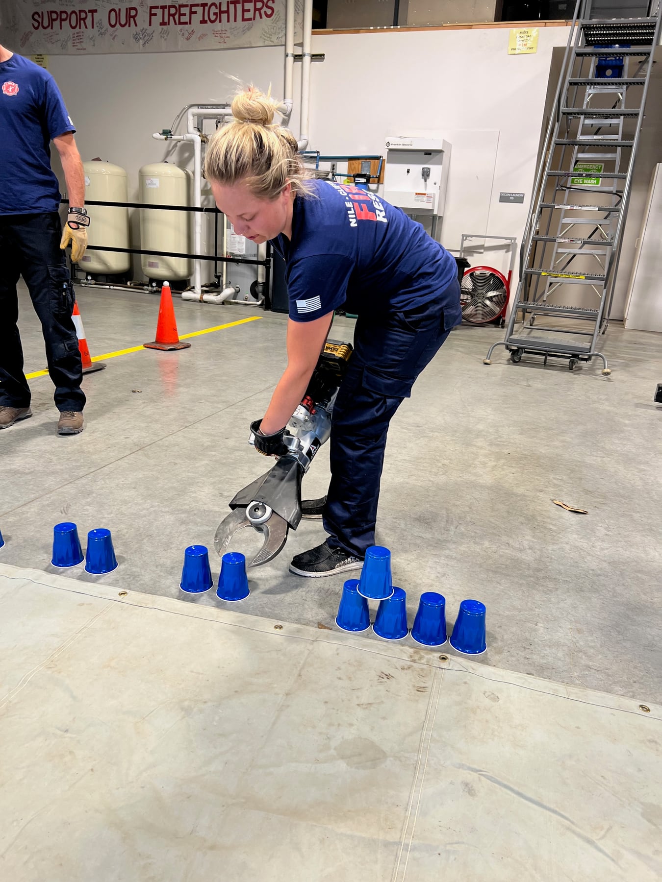A department member practices hands-on emergency medical skills during a station drill
